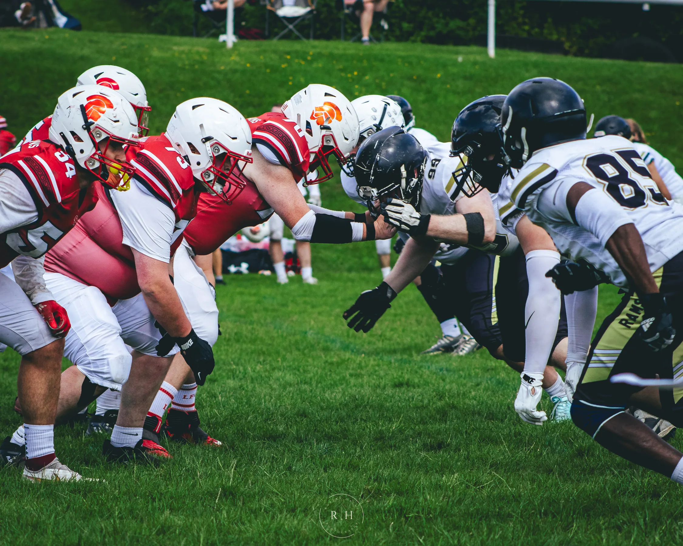 The Rams and Romans battle at the line of scrimmage