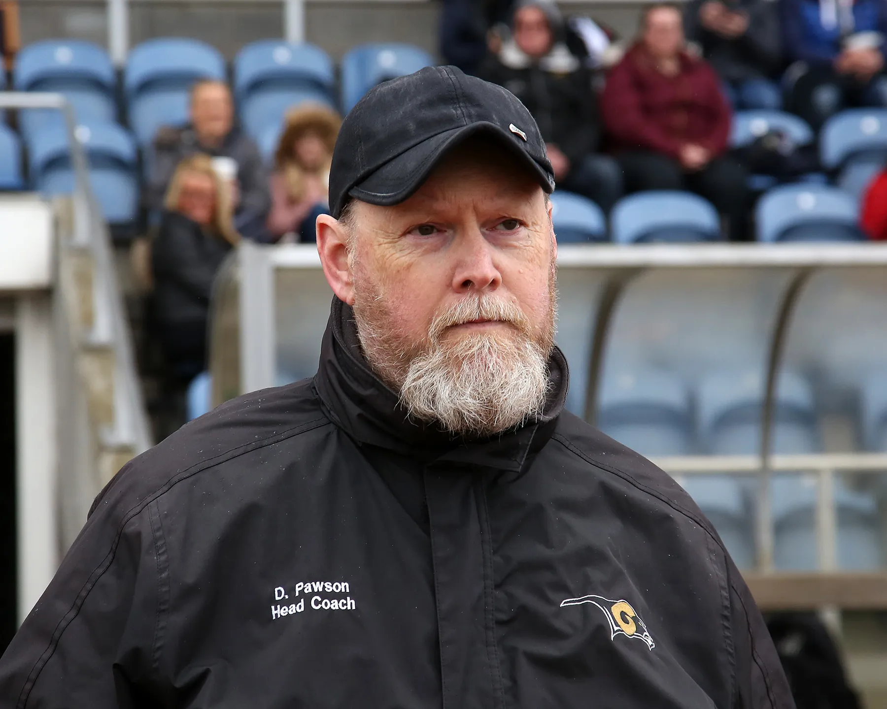 Coach Pawson walks onto the field at John Charles Stadium