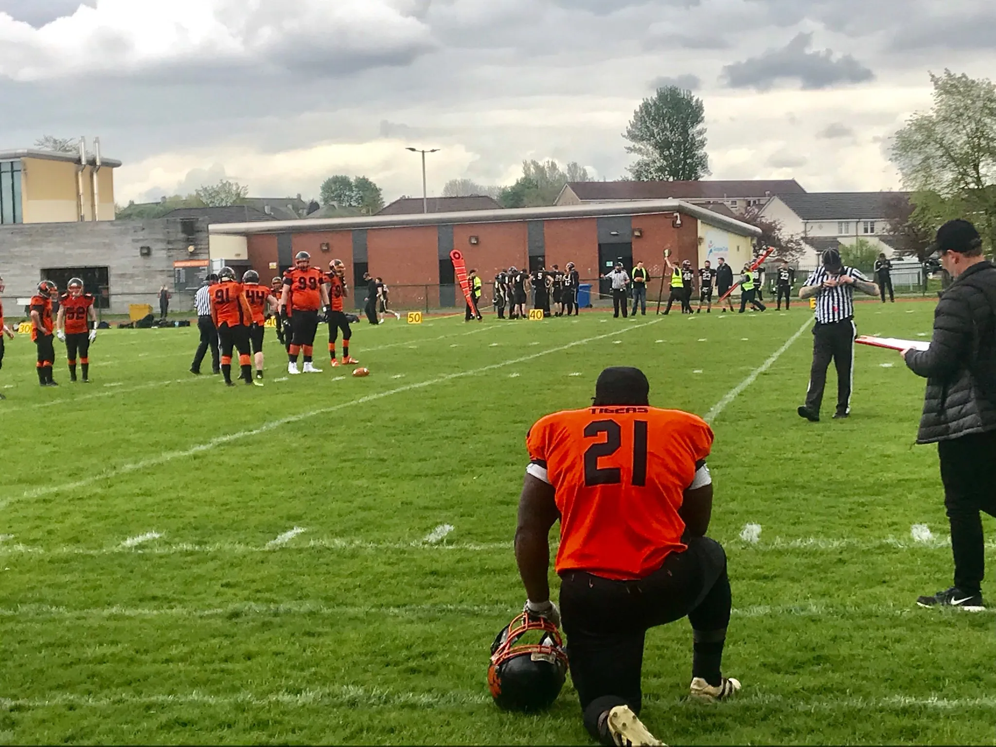 A Tigers player looks on as his team wait for the Rams offense